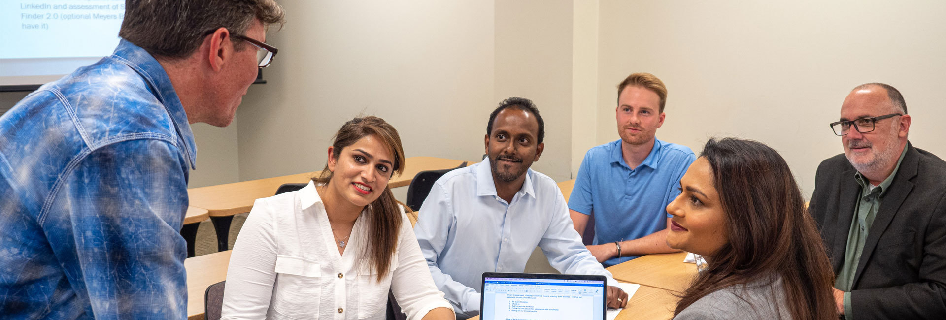 Business professionals collaborating on a project