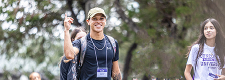 A Concordia freshman student doing the CTX woosh sign