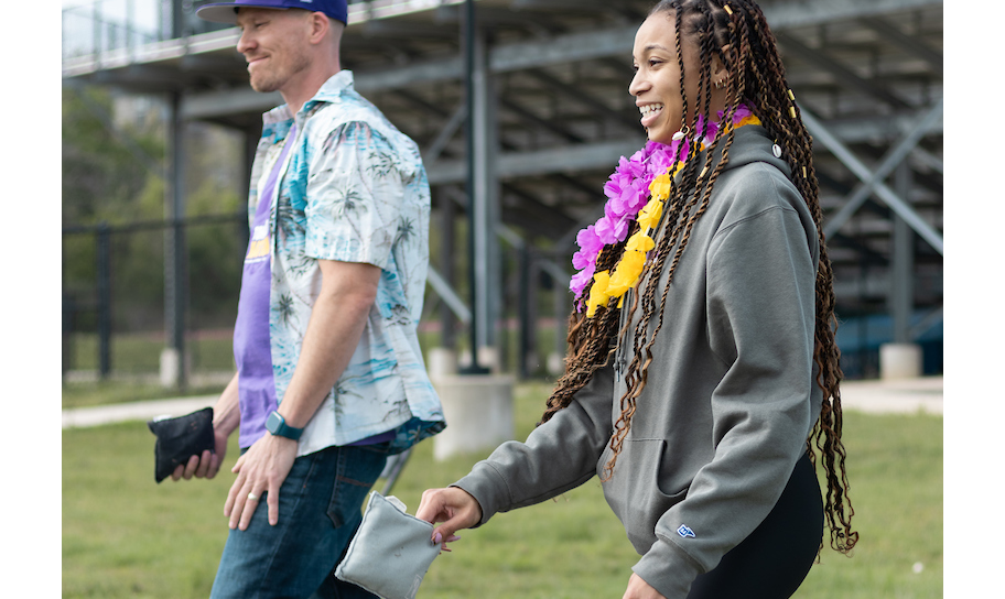 Concordia Texas University student vs. staff cornhole match