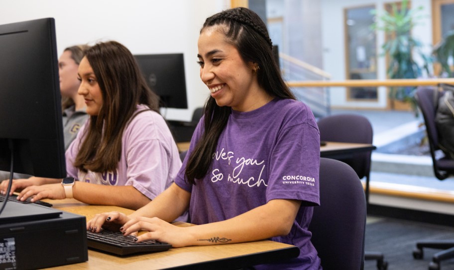 Students working on edits with each other