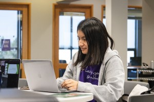 Concordia University Texas student working on source code for a computer science class.