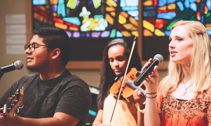 Students singing during Chapel